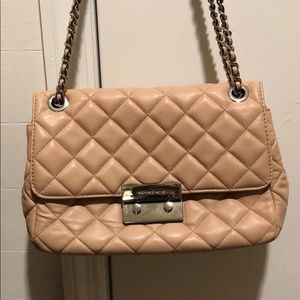 Pale pink cross body Michael Kors purse